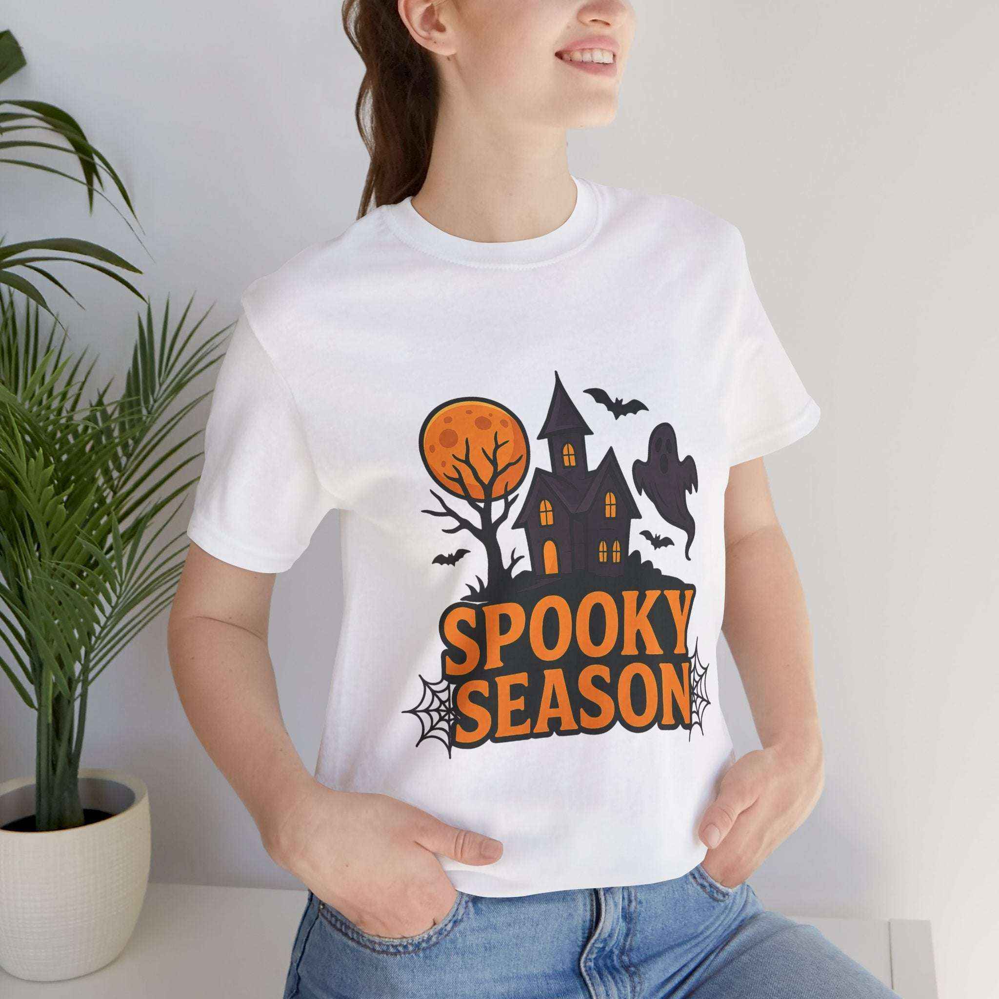 Spooky Season Halloween T-Shirt - Haunted House Ghost Bat Graphic Tee for Halloween Enthusiasts - Atlas Briefly